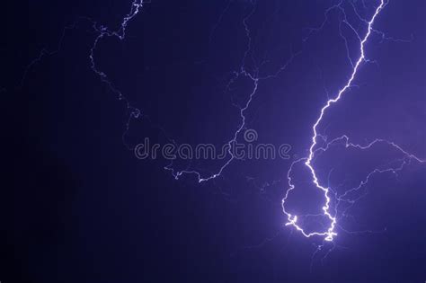 Lightning Storm Over City In Purple Light Stock Image Image Of Energy