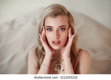 Beautiful Passionate Blonde Girl On Sand Stock Photo