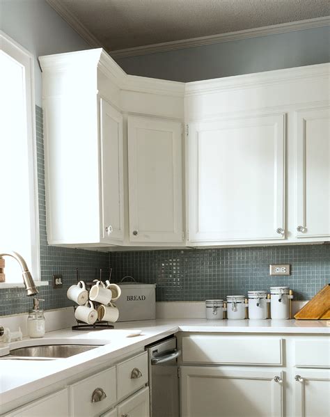 The existing cabinets had a gap between the tops of the cabinets and the ceiling. How To Add Height To Kitchen Cabinets
