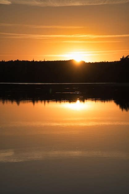 Premium Photo Sunset With Reflection On A Swedish Lake In Smalland