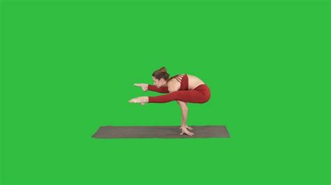 Beautiful Woman Practices Handstand Yoga Asana Tittibhasana Stock Footage