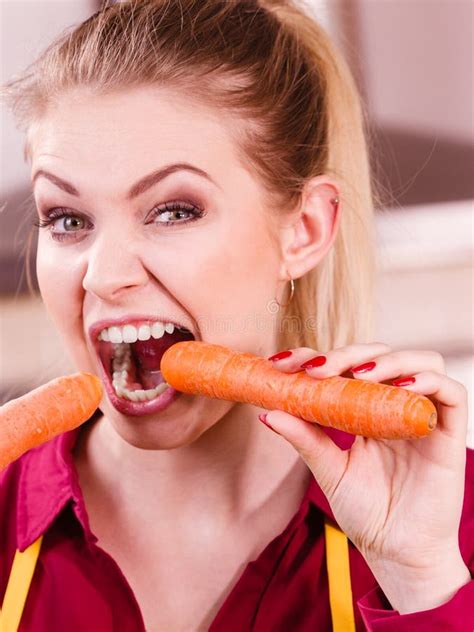 Woman Holding Biting Carrot Stock Image Image Of Dieting Happy