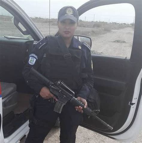 Mexican Police Officer Suspended After Topless Rifle Selfie Taken On