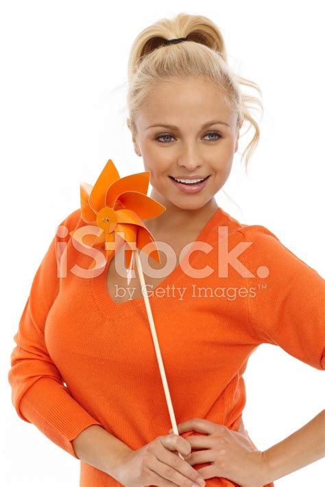 Pretty Blond Holding Pinwheel Smiling Stock Photo Royalty Free