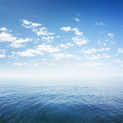 Blue Sky Over Sea Or Ocean Water Royalty Free Stock Image