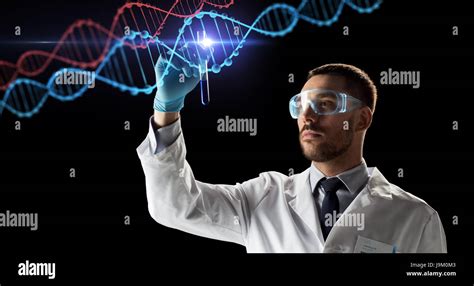 Scientist With Test Tube And Dna Molecule Stock Photo Alamy