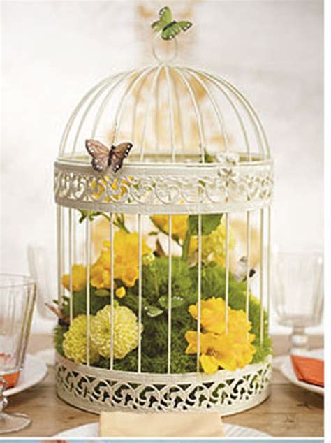 Find a wide selection of furniture and home decor options that will complement your space. Flower Arrangement in White Birdcage with Yellow and Green ...