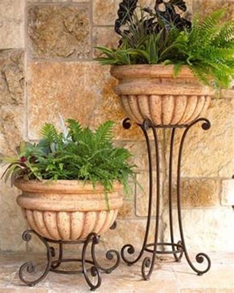 Home Design And Decor Wrought Iron Planters Tall And Short Wrought