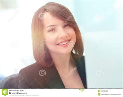 Beautiful Business Woman Dreaming While Working On Computer At H Stock