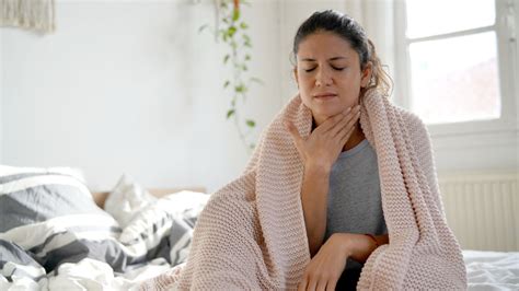 what it really means when you wake up with a sore throat