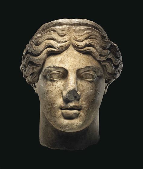 A Roman Marble Head Of Apollo Circa 1st Century Bc 1st Century Ad