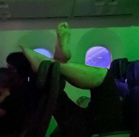 With Passenger S Bare Feet In The Air American Airlines Says Everyone S Trying To Stay Comfy
