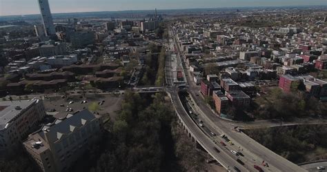 Jersey City Aerials Flying Over Buildings And Freeway 1290961 Stock Video