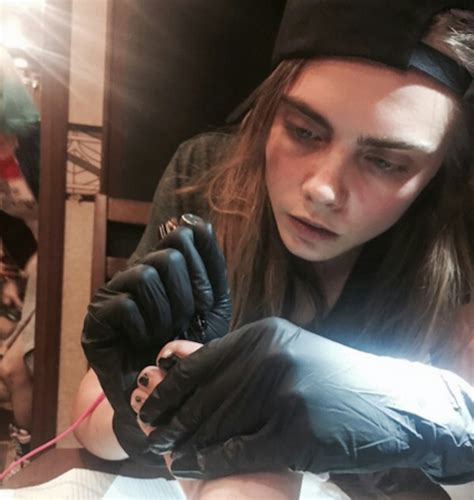 A Guide To Cara Delevingnes Tattoos And Their Meanings Fashion Grazia