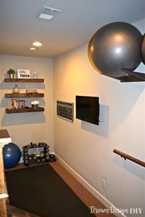 Table of contents diy home gym, exercise room & home office on a budget diy entertainment center & bookcase for storage & organization in our diy home gym Workout Ball Holder - Home Gym Organization | Workout room ...