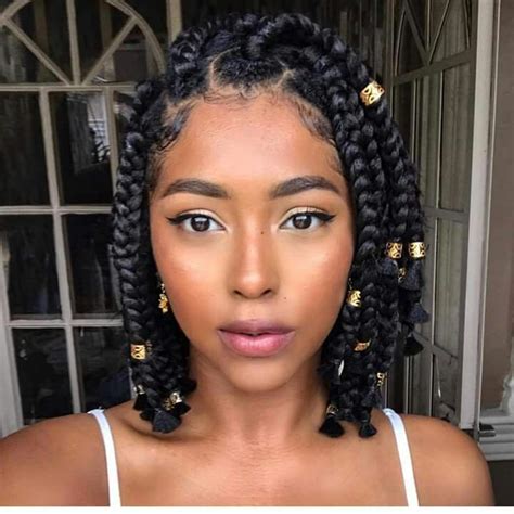 They are simply curly box braids with curly hair braided into the box braids to give a soft, fuller and voluminous look. Short jumbo box braids | Natural hair styles, Short box ...