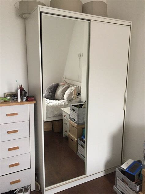 They may feature mirrors on all sides for a contemporary design which also hold a practical use. IKEA - Large white modern wardrobe with sliding door ...