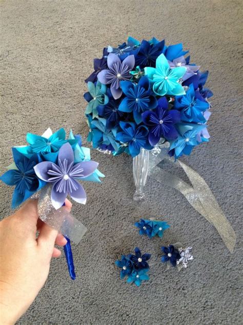 We need only 11 dollar bills. Origami Bouquets!