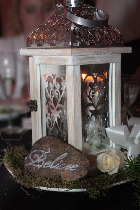 centerpieces. also instead of table numbers we did names Unique Table