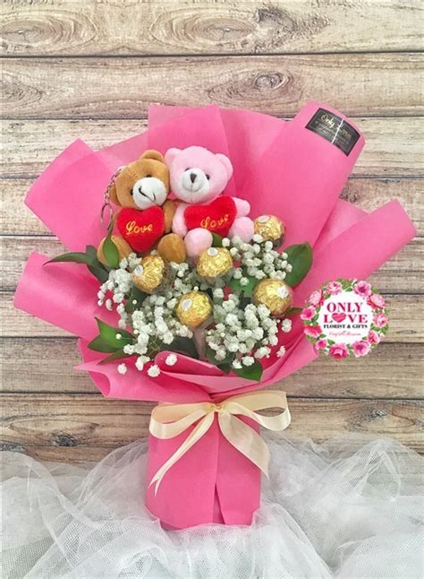 Choose chocolates with gold foil like ferrero rocher or chocoladorro and a suitable form. E15 Ferrero Rocher Bouquet sameday flower delivery to ...