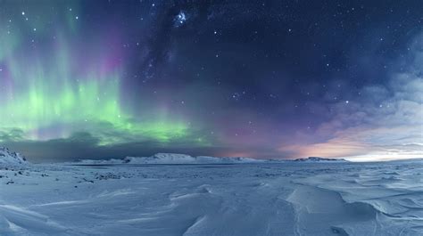 Aurora Borealis Over Frozen Lake Northern Lights In Night Sky Winter