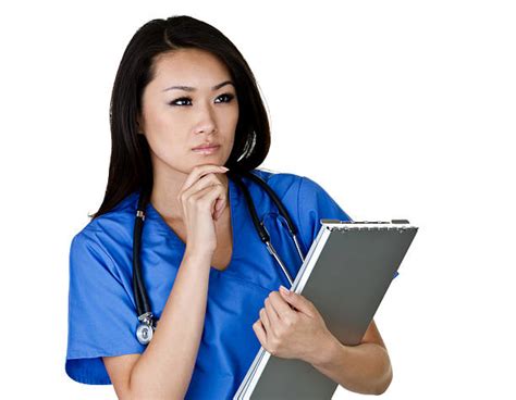 Female Nurse Thinking Stock Photos Pictures And Royalty Free Images Istock