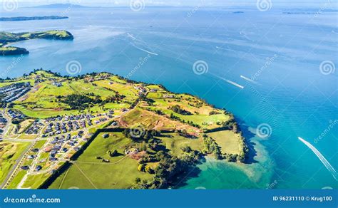 Aerial View On Residential Suburbs Surrounded By Sunny Ocean Harbour