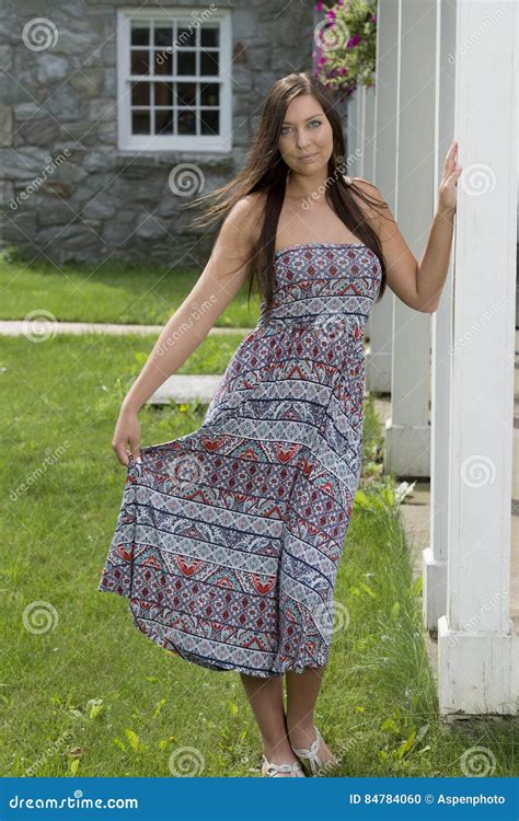 Pretty Young Woman In Sundress Standing Near Porch Stock Photo Image