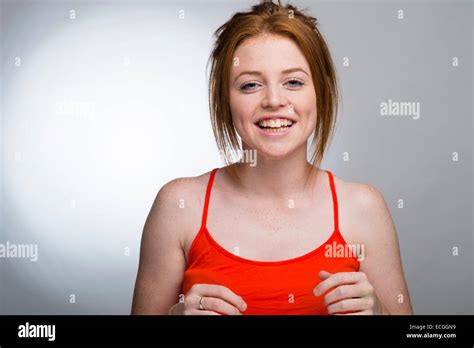 a happy smiling laughing confident positive ginger haired freckled skinned 16 17 18 year old
