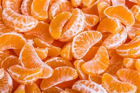 Tangerine Segments Orange Background Texture Stock Photo By ©bukhta79