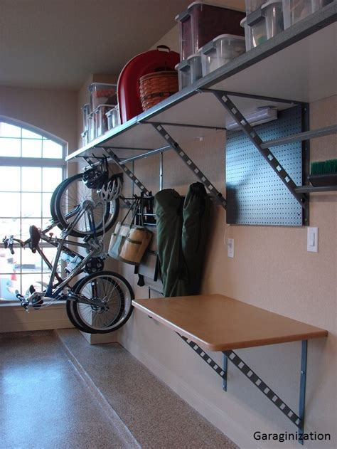 The next sets of shelving to install were on the opposite wall from the previous shelving, and these are directly above our garage door. 5 Tips For DIY Garage Storage | Garage Storage Ideas