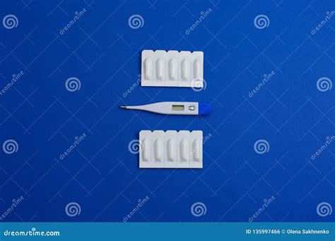 medical suppository rectal or vaginal isolated on blue background royalty free stock