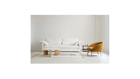 Any further, and you won't be able to comfortably reach it when enjoying a snack or finding the remote. Native Coffee Table - Cam Interiors