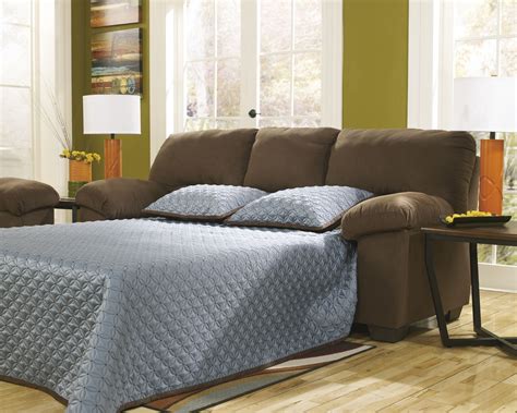 A thick, comfortable mattress that pulls out. Benchcraft by AshleyZadee - ChocolateFull Sofa Sleeper ...