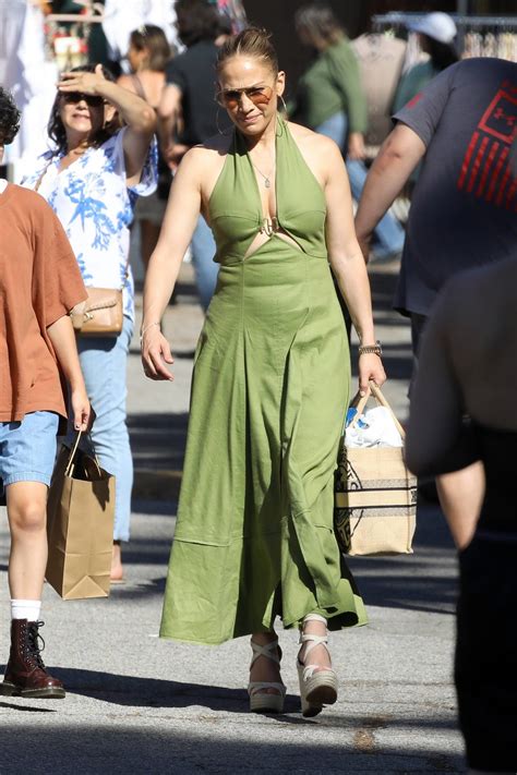 Jennifer Lopez Looks Great In A Green Dress While Out Shopping With Her