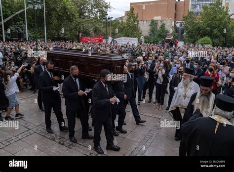Pallbearers carry the coffin of late Greek composer Mikis Theodorakis