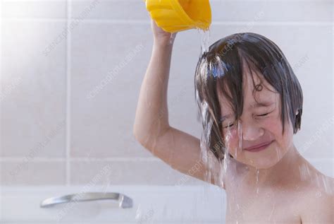 Girl Washing Her Hair In Bath Stock Image F006 6493 Science Photo Library