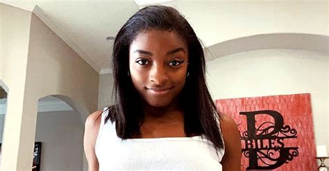 Gymnast Simone Biles Flaunts Her Enviable Figure In Red Swimsuit By The Pool In A New Picture