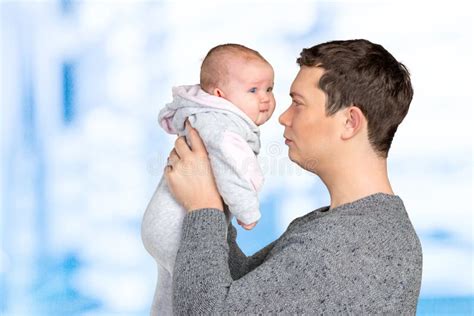 Man Holding A Baby Stock Image Image Of Baby Offspring 70079991