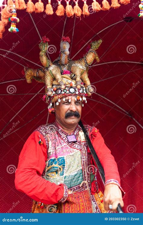 Indian Rajasthani Handsome Man In Traditional Clothes Camel Festival In Rajasthan India