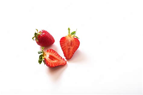 Premium Photo Two Strawberries Isolated On White Background Inside