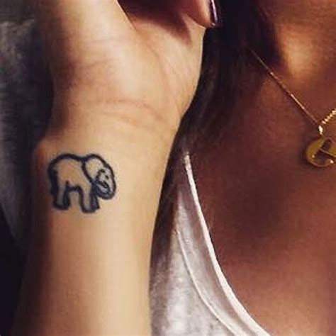 This post is for you if you are looking for some inspirations. Eleanor Calder Elephant Wrist Tattoo | Steal Her Style