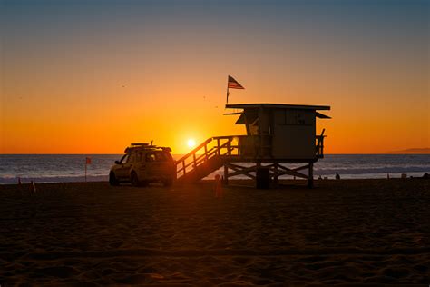 Lifeguard Tower At Sunset On California Beach Stock Photo Download