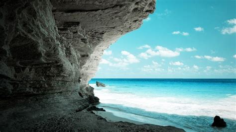 Download Wallpaper 1920x1080 Cave Sea Coast Rock Paradise Full Hd
