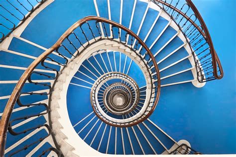 Hypnotizing Architectural Photography Of Spiral Staircases