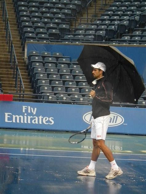 Just Playin In The Rain Novak Djokovic Basketball Court Rain