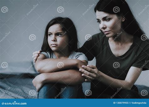 Closeup of Mother Embraces Soothes Upset Daughter Stock Image - Image