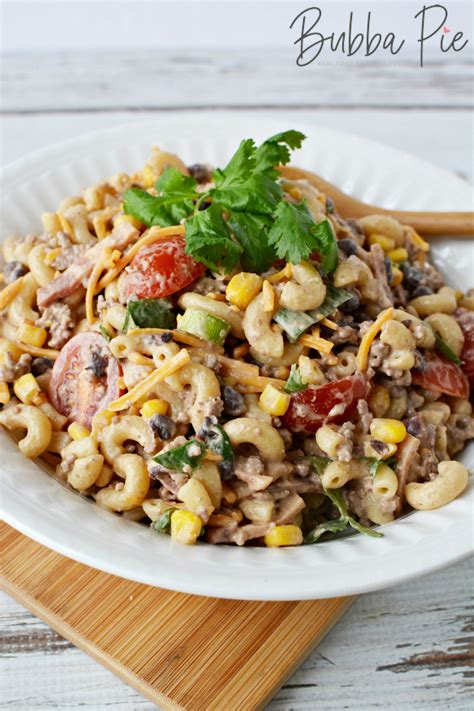 Apart from pasta salad, baked beans will help fill your guests' tummies quickly. Cowboy Pasta Salad - Easy Recipe to Feed a Crowd! - BubbaPie