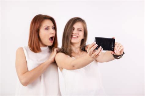 two happy girls taking a selfie stock image image of portrait selfie 123120499