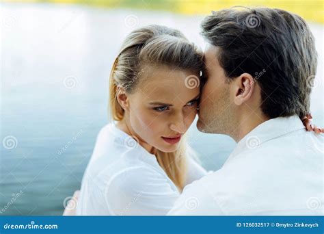 Beautiful Young Woman Being Kissed By Her Husband Stock Image Image